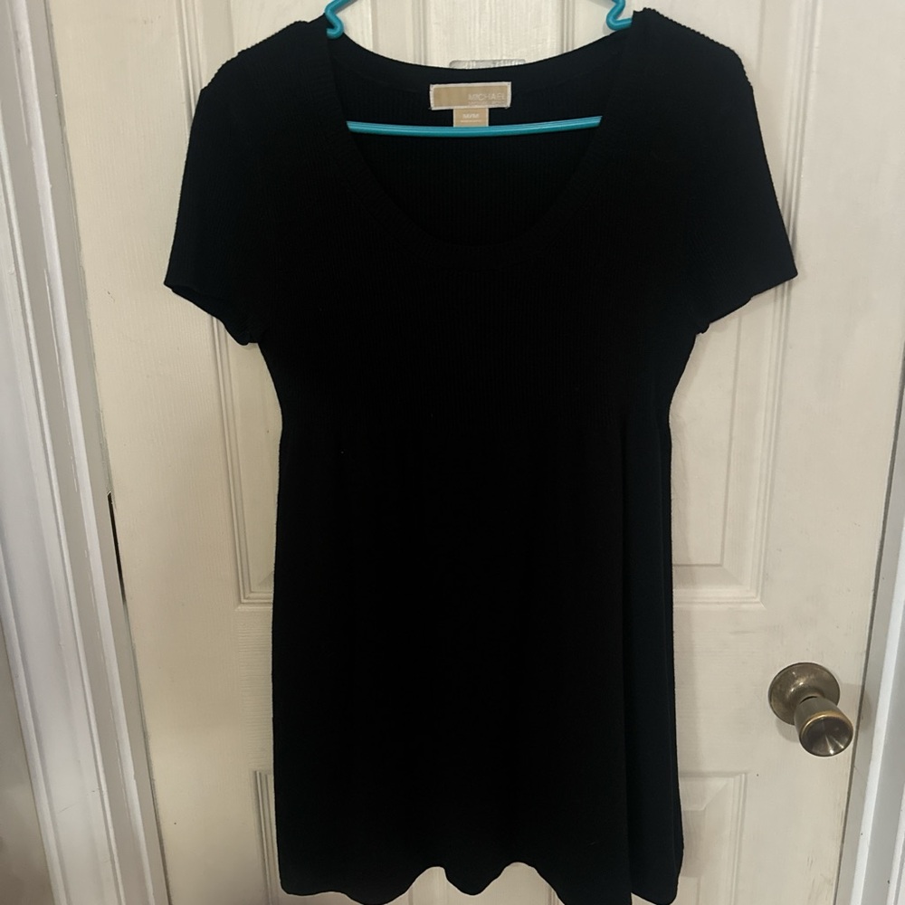 A black Micheal Kors sweater dress